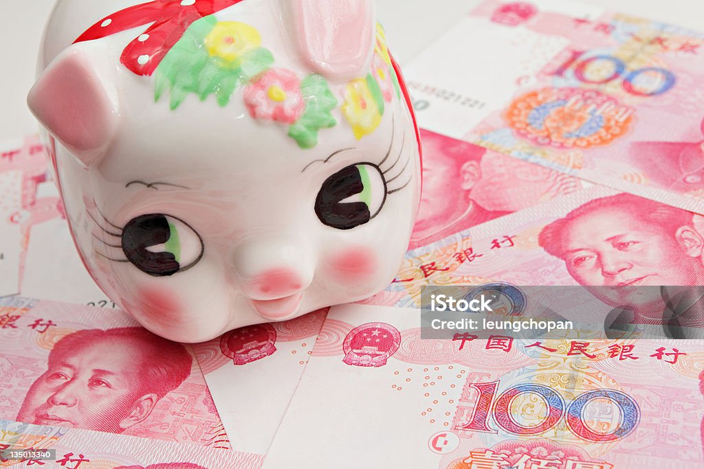 piggy bank on china dollar banknote piggy bank on china banknote Abundance Stock Photo