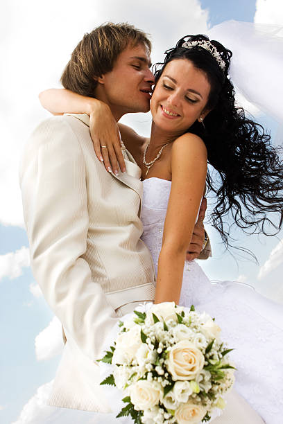istock Bride and groom kissing 135013524