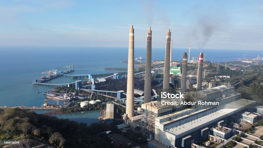 Power Plant Steam power plant in Indonesia with harbor view Indonesia Stock Photo