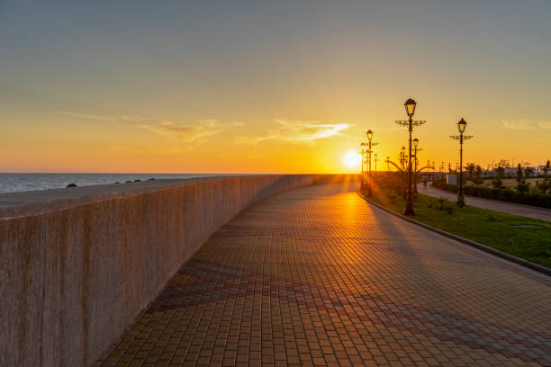 istock Beautiful sunset over the Olympic embankment. Sochi 1350139234