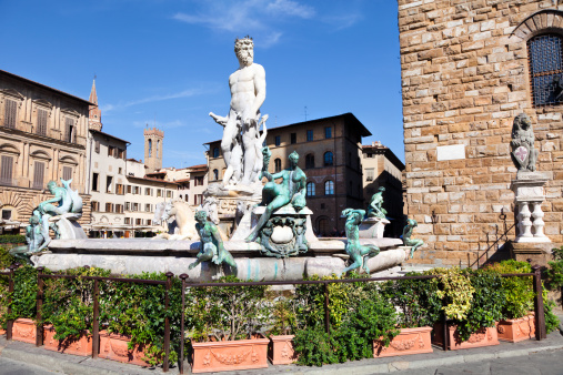 View of Neptun fontain situated on the Piazza della Signoria in front of Palazzo Vecchio, Florence, Italy