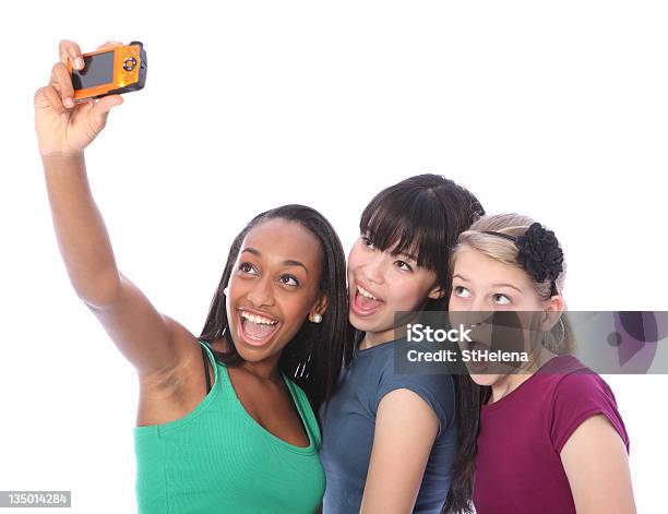 Three Teenage Girl Friends Fun With Digital Camera Stock Photo - Download Image Now - African Ethnicity, African-American Ethnicity, Asian and Indian Ethnicities