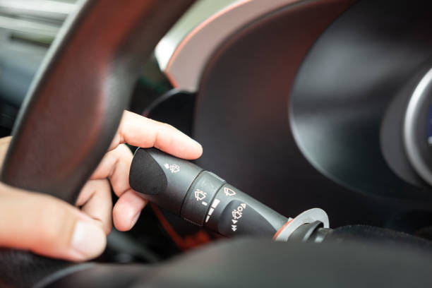istock Controlling lever switch to activate the rain wiper blade. 1350157703
