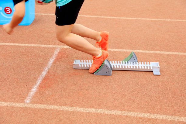 istock the athlete sprint start, The sprinters are at the starting line 1350158332