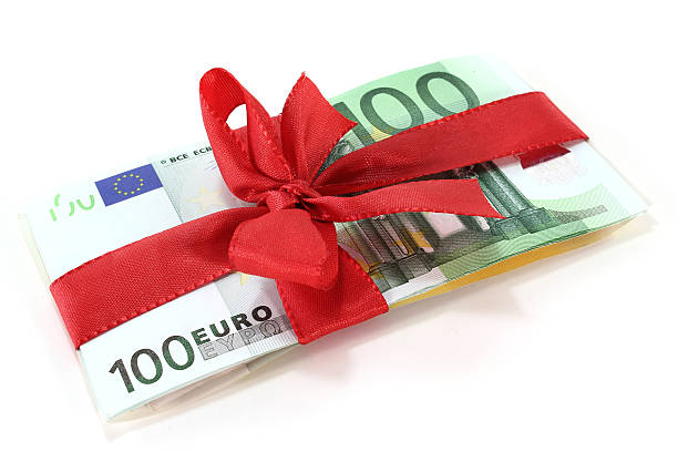 istock Euro with red ribbon 135015894