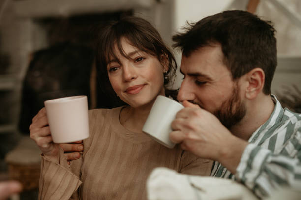 istock Loving couple enjoying their tea 1350161278