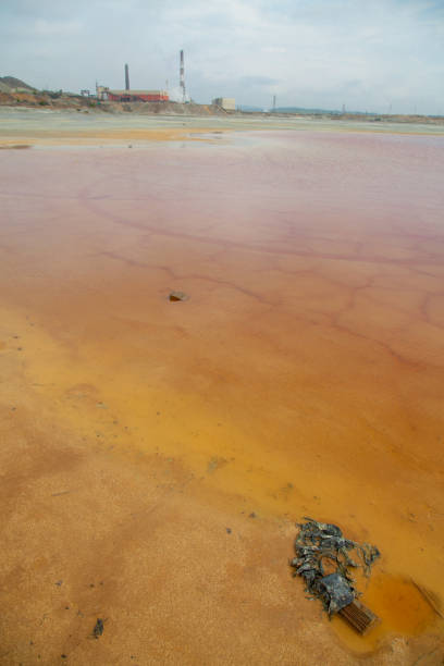 istock The plant discharges waste into water. Ecological catastrophy 1350162000