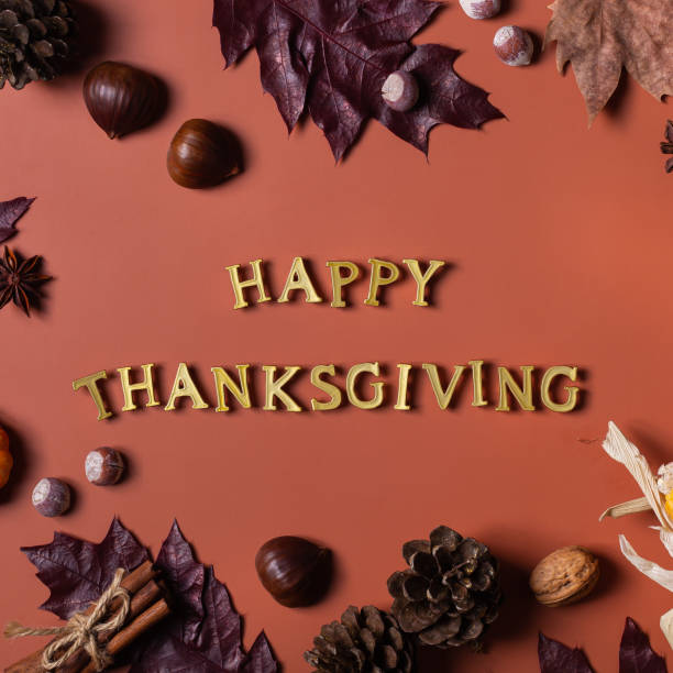 istock Autumn fall thanksgiving day composition with decorative dried leaves 1350162273