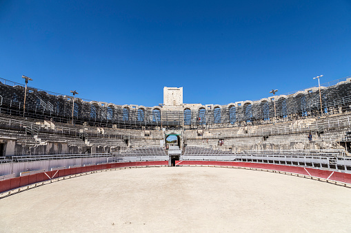 Arles, France - August 21, 2016: view to famous arena in Arles, France. The old arena still serves as stadium for bull fights.