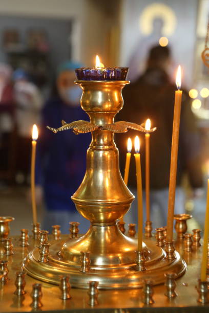 istock Burning candles in the cathedral 1350170363