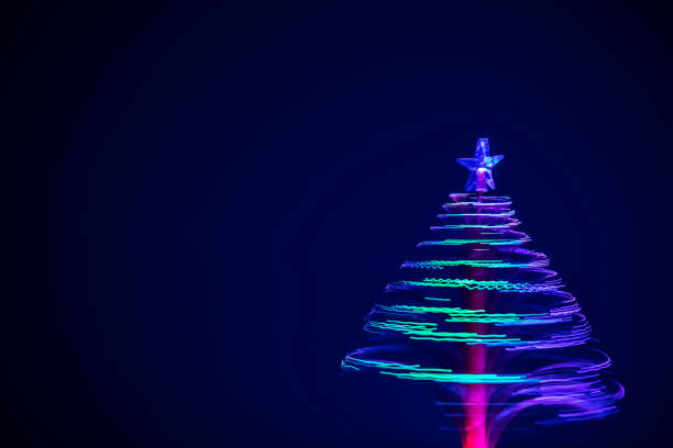 istock Spinning fiber optic Christmas Tree with space for copy 1350172820