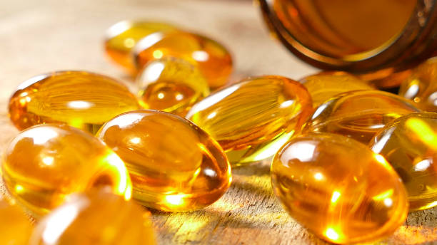 cápsulas de vitaminas omega-3 - capsule fish oil fish pill fotografías e imágenes de stock