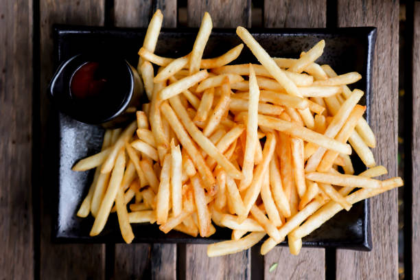 istock French fries with ketchup and mayonnaise 1350178064