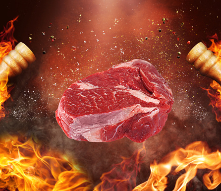 Steak on a hot and spicy background