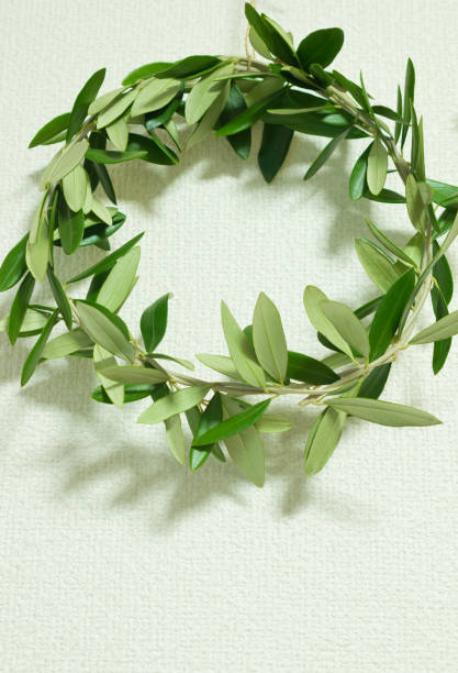 istock Wreath made of olive branches and leaves with a natural image 1350191283