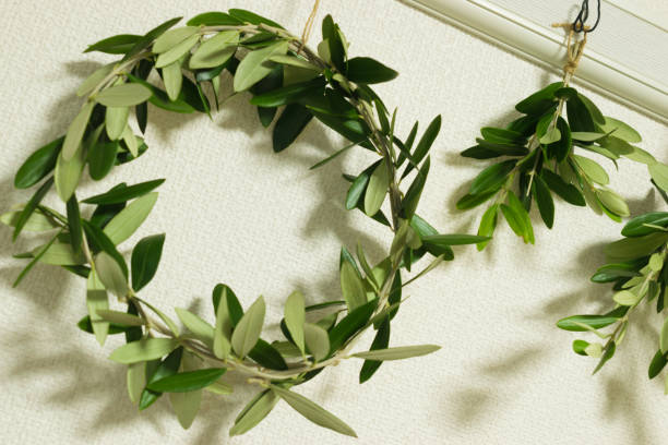 istock Wreath made of olive branches and leaves with a natural image 1350191367