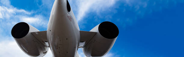 istock an airplane business jet tail close-up image on beautiful sky 1350192551