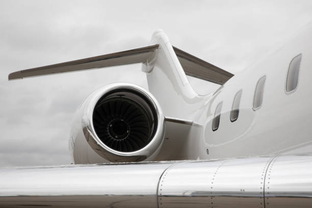 istock Engine of a private airplane over cloudy sky 1350192630