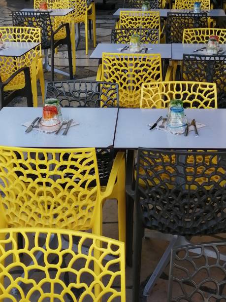 Outdoor cafe in yellow mood stock photo