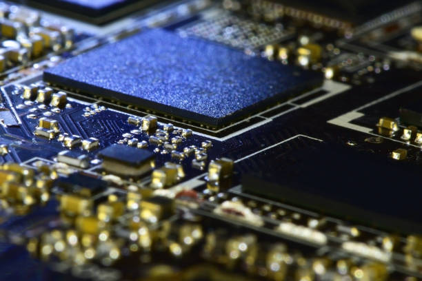 istock Fragment of installation of uncased electronic components 1350197683