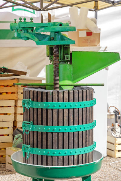 Cider Pooring Machine 10+ Cider Crusher Stock Photos, Pictures & Royalty-Free Images - iStock
