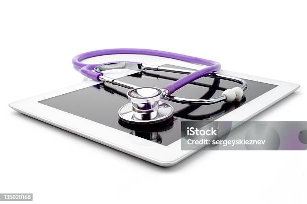 Purple Stethoscope On Top Of White Digital Tablet Stock Photo - Download Image Now - Stethoscope, Digital Tablet, Healthcare And Medicine