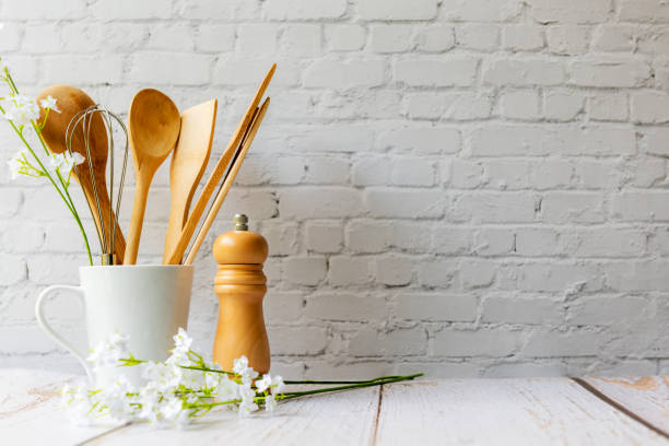 istock Kitchen tools and kitchenware utensil object on kitchen shelf wood white for healthy eat and health care life. 1350202103