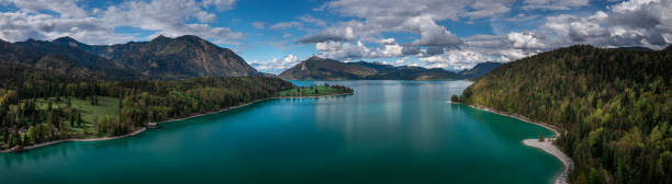 istock Panorama of Lake Walchensee with blue sky from above, Bavaria 1350204564