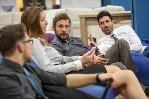 istock Creative open office business meeting 1350209830