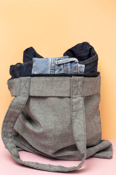 istock Blue jeans on colorful background isolated 1350211198