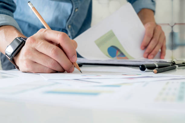istock Young businessman working on new startup project at office. 1350211266