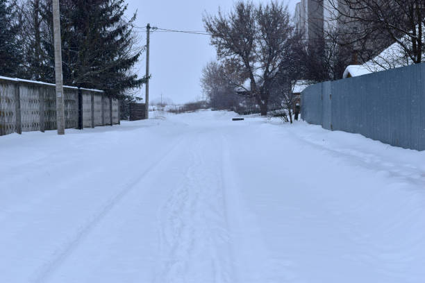 istock Rural road covered with snow. 1350216164