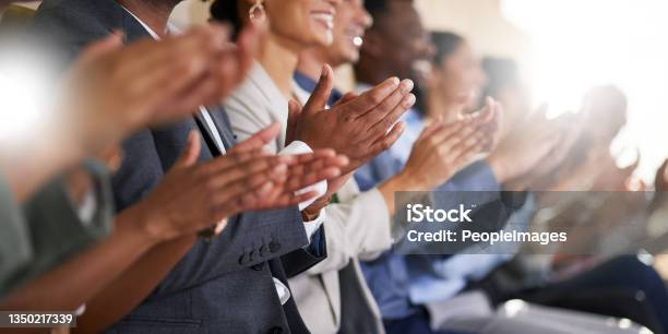 Cropped Shot Of An Unrecognizable Diverse Group Of Businesspeople Applauding While Sitting In The Boardroom During A Presentation Stock Photo - Download Image Now