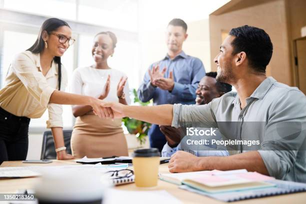 Cropped Shot Of Two Young Businesspeople Shaking Hands During A Meeting In The Boardroom Stock Photo - Download Image Now