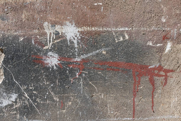 istock abstract paint smudges and scratches on textured wall 1350218372