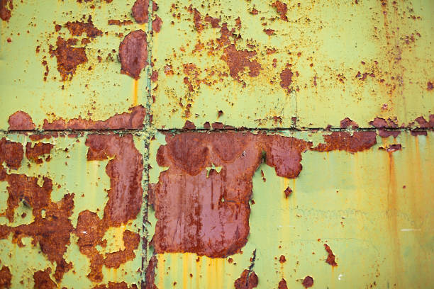 istock Rusty metal. Wall texture with green paint. 1350223039