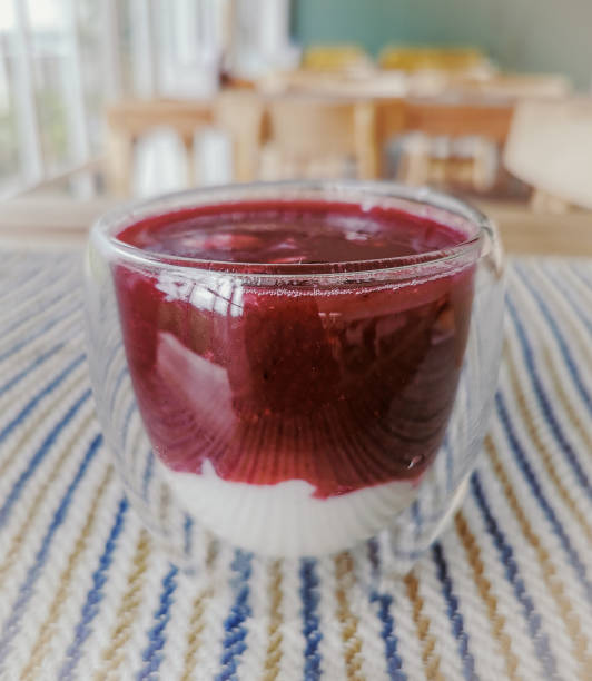 istock A glass of berry yoghurt on the table 1350223130