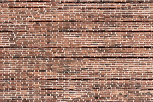 istock A wide brick blank wall of an old building. 1350223880