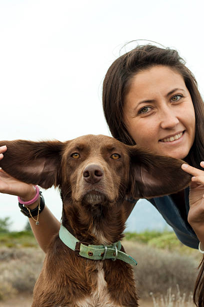 istock woman with dog 135023155