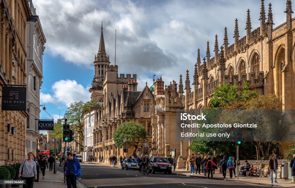 High Street in Oxford, with the Church of St Mary the Virgin and All Saints Church (the library of Lincoln College). Oxford, UK - September 21 2018: View of the High Street with the University Church of St Mary the Virgin and All Saints Church, now the library of Lincoln College. Oxford - England Stock Photo