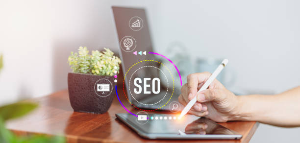 istock Using a smartphone and a tablet computer for SEO and digital marketing media based on network technologies 1350236892