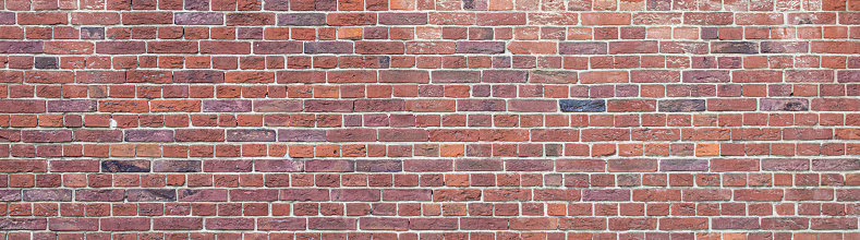 photo of texture of old grunge red brick wall background