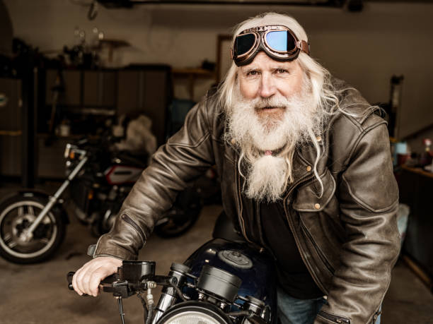 istock Senior man working on his motorcycle 1350239210