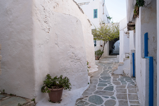 Folegandros island, Greece, Cyclades. Narrow street in Kastro, old castle in Chora. Whitewashed houses and stairs, Cycladic architecture