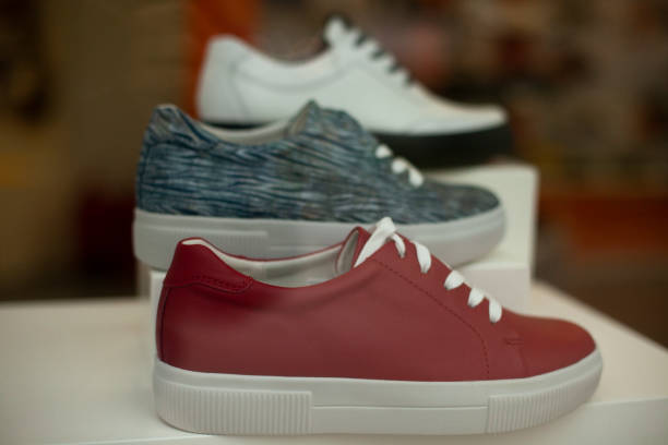 istock Women's shoes on display. Lightweight shoes without logos. 1350241692