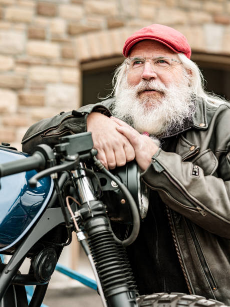 istock Senior man working on his vintage motorcycle 1350253866