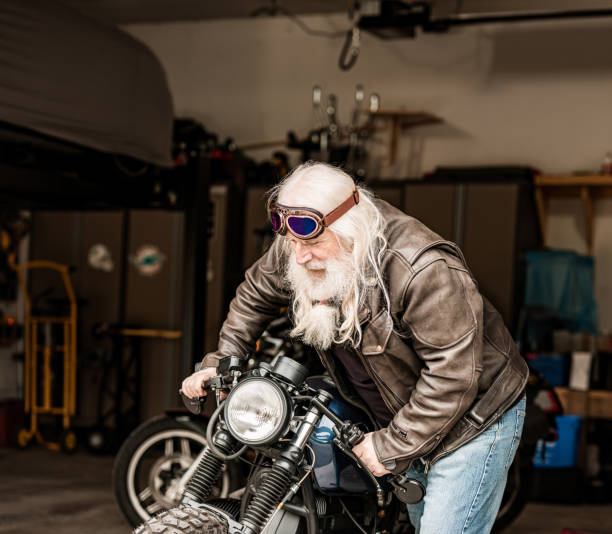istock Senior man working on his vintage motorcycle 1350253931