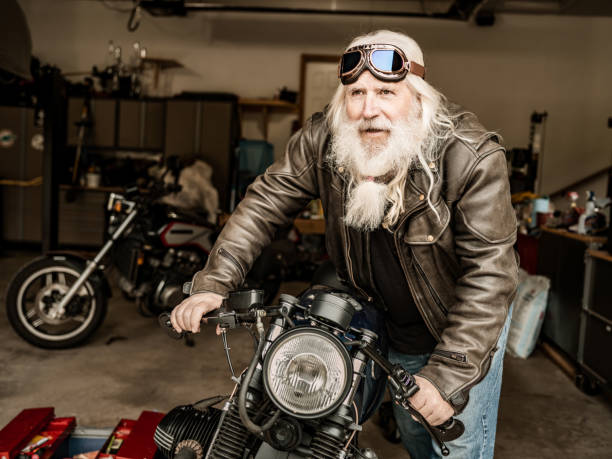 istock Senior man working on his vintage motorcycle 1350254690