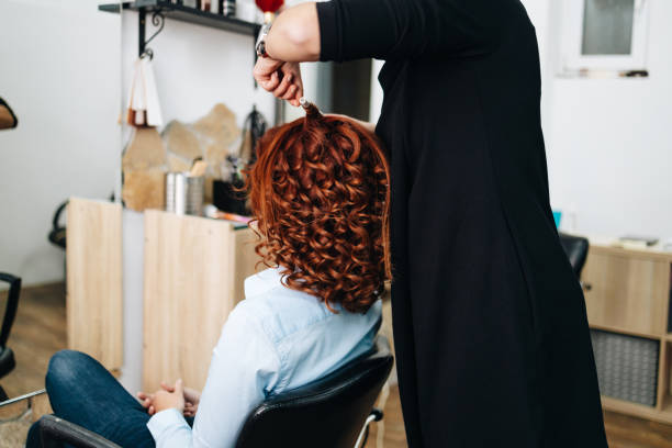 istock Woman at hair salon 1350255821