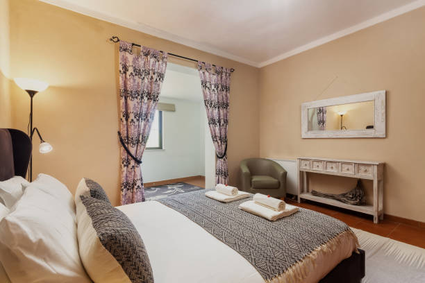 istock Bedroom in classic traditional Mediterranean style with double bed. With a mirror. 1350257233